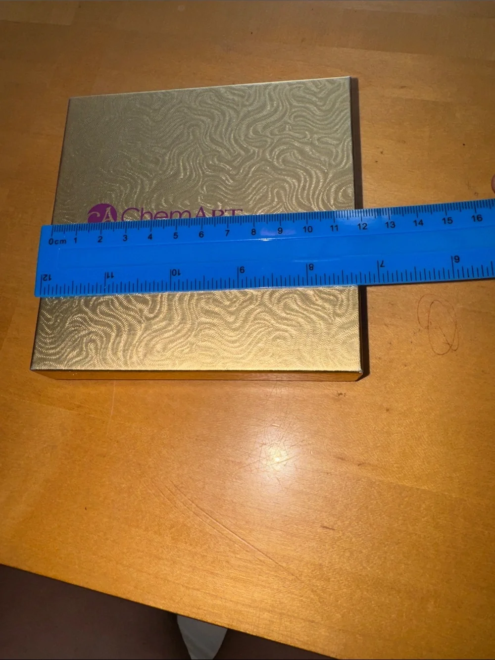 2 gold-finished decorative metal snowflake or floral ornaments made by ChemArt
